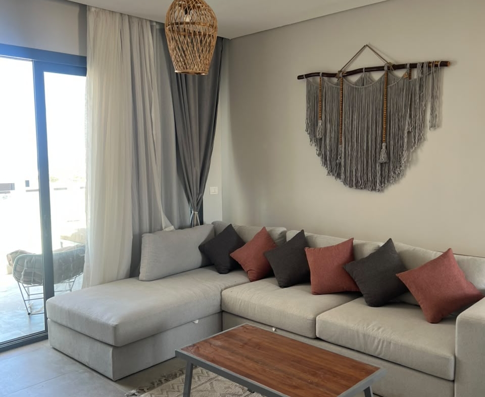 Furnished living room in 2-bedroom apartment, Reef Town Soma Bay